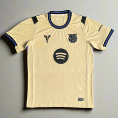 Barcelona jersey with black accents on a green background