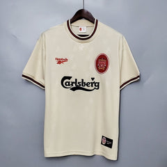 Liverpool 1996-97 Away Retro Jersey in ecru color with green collar, displaying the Carlsberg sponsor logo and the Liverpool FC crest.